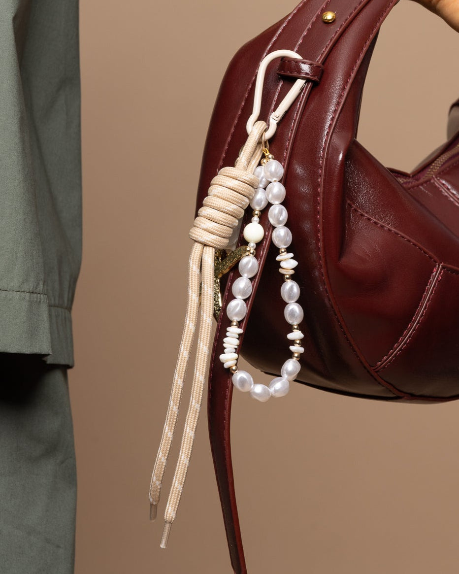 Décoration de sac cordon et perles