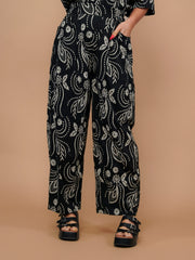 Pantalon noir effet broderie anglaise