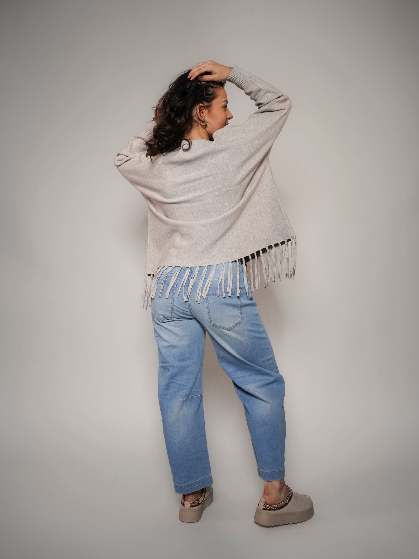 Pull beige à franges