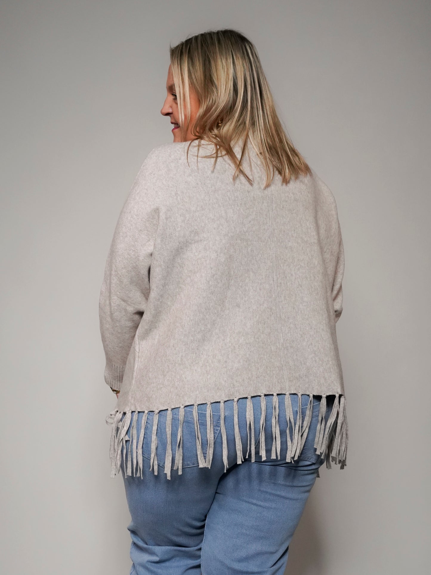 Pull beige à franges