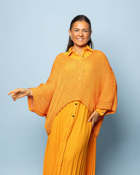 Pull col V en crochet safran